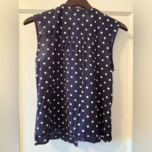 Like new, worn once, XS old navy blue with white spots.
